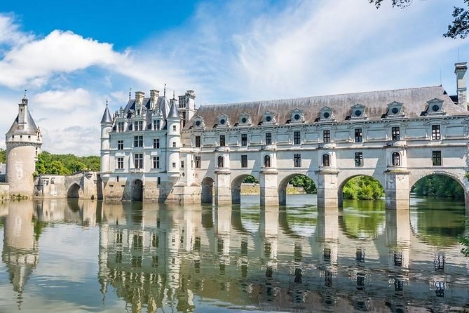 Château de Chenonceau on its arches across the Cher, the gallery reflected in the river